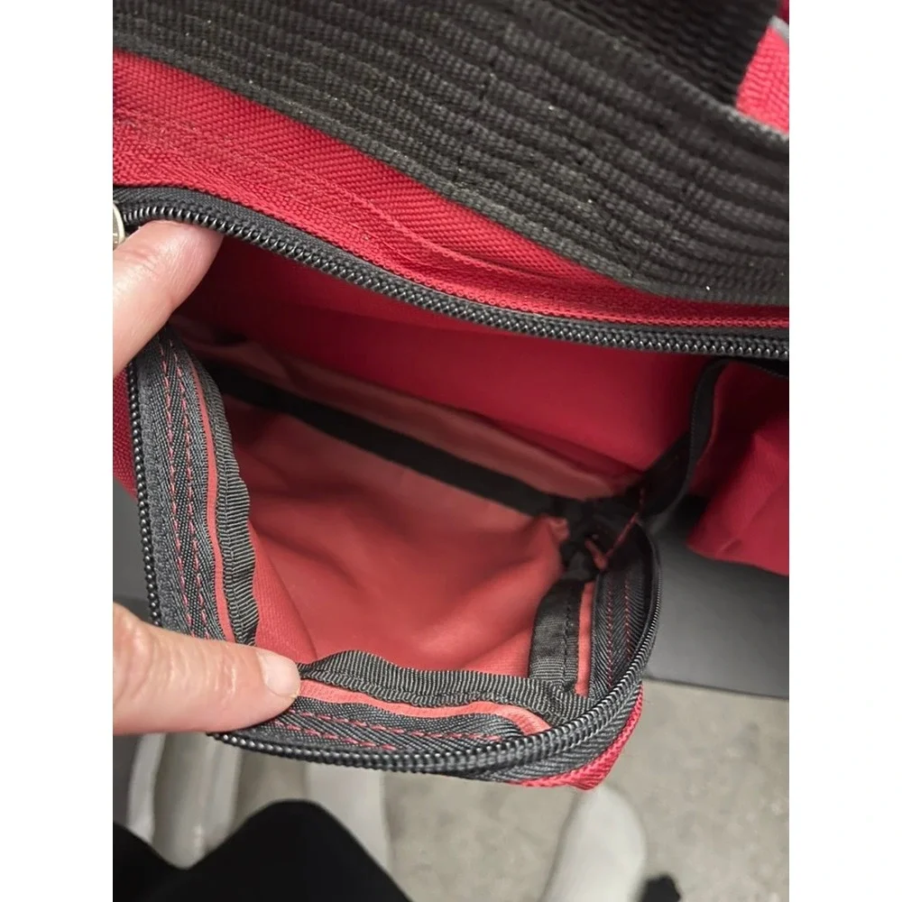 Olympia Sports Plus Red Rolling Duffel Bag Travel Luggage Retractable Handle